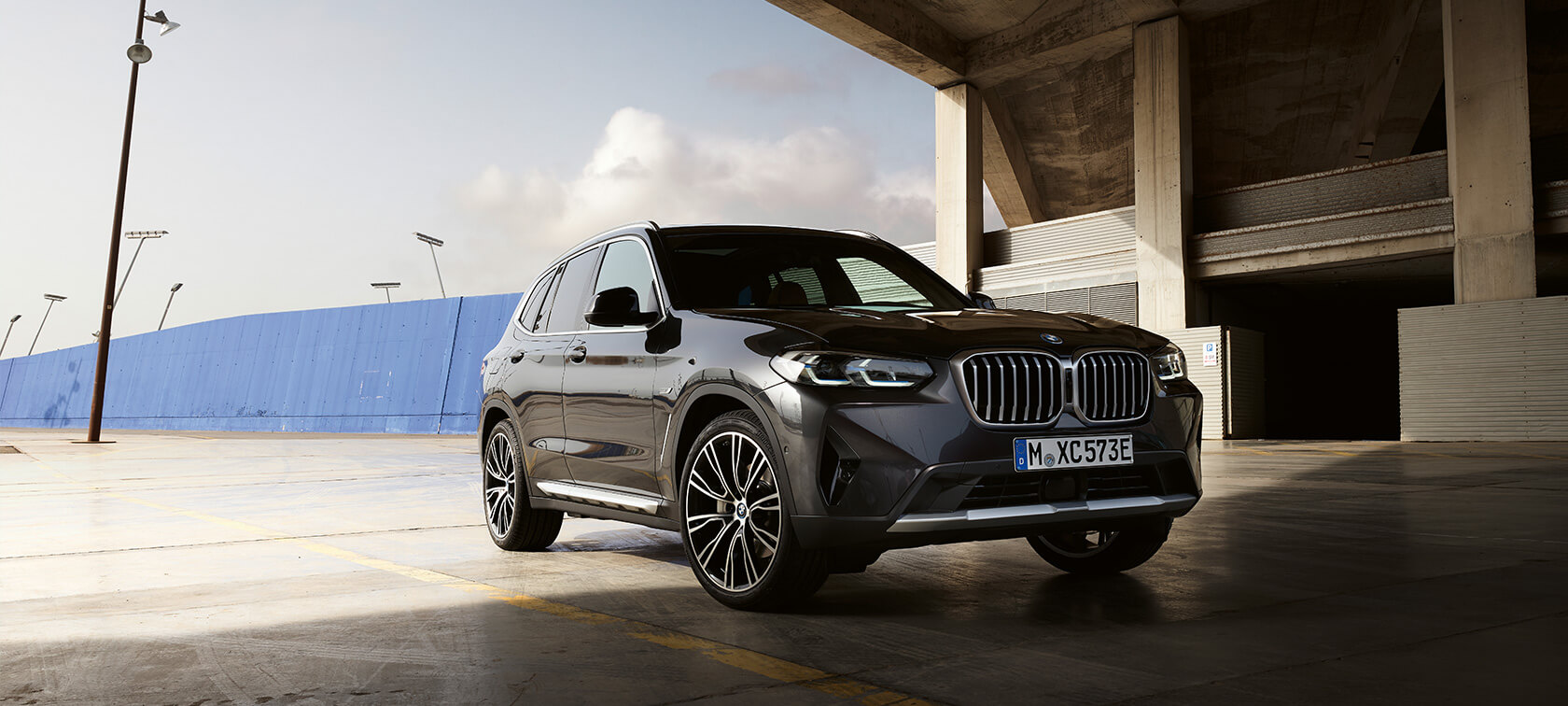 BMW X3 G01 Sophisto Grey three-quarter front view in front of hangar 2021